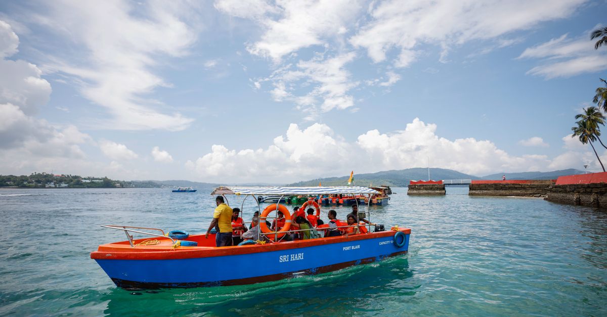 Andaman boat trip clear turquoise water